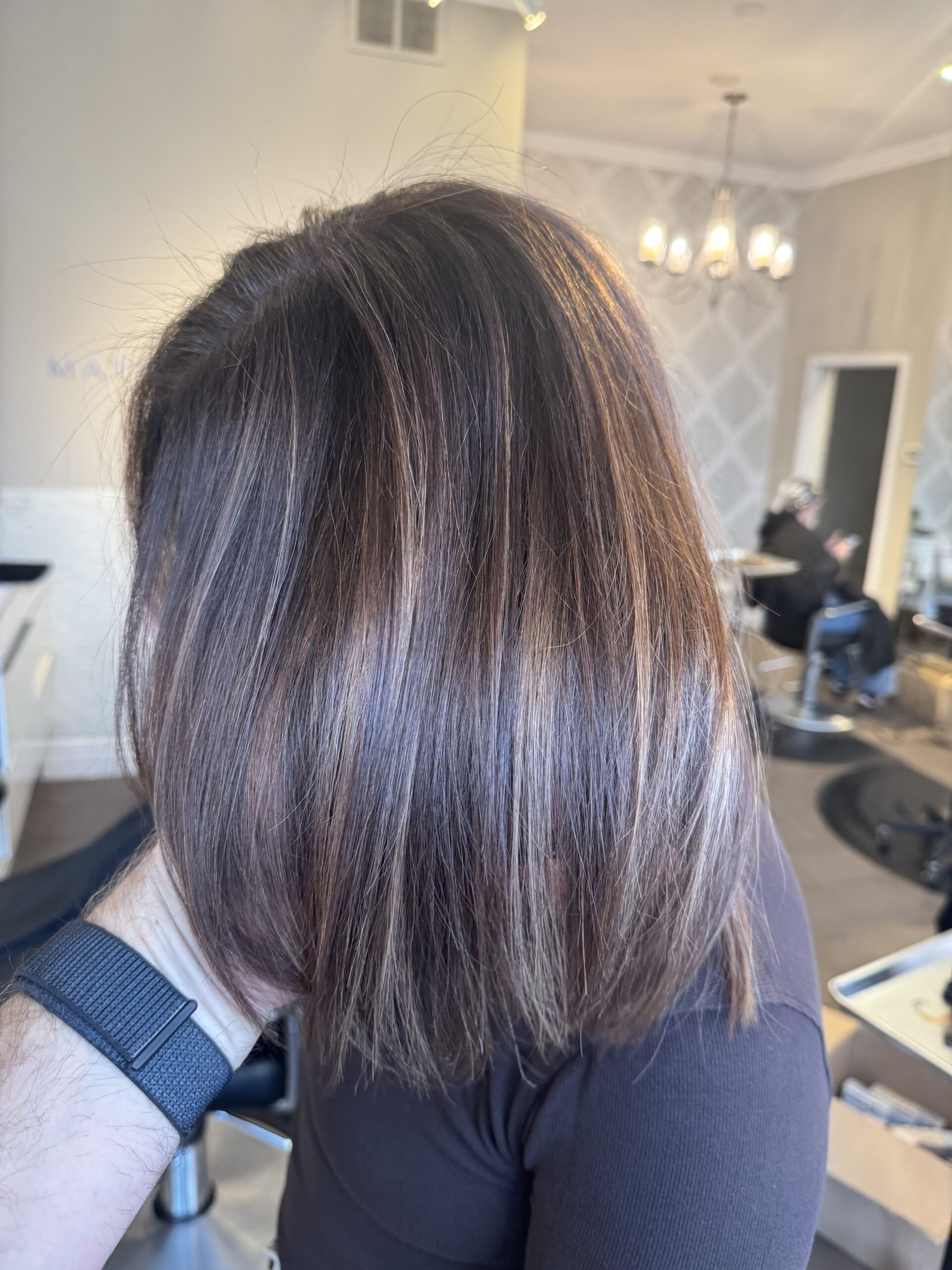 Balayage refresh result at Matthew Jonathan Salon in Oakville — dimensional colour with lifted ends and rich depth