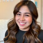 Fenny, balayage specialist at Matthew Jonathan Salon in Oakville, with hand-painted brunette balayage